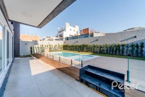 Casa em Condomínio à venda com 289m², 4 dormitórios, 4 suítes, 2 vagas, no bairro Alphaville em PORTO ALEGRE