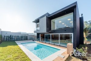 Casa em Condomínio à venda com 289m², 4 dormitórios, 4 suítes, 2 vagas, no bairro Alphaville em PORTO ALEGRE