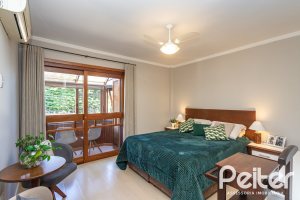 Casa à venda com 174m², 3 dormitórios, 1 suíte, 2 vagas, no bairro Ipanema em Porto Alegre