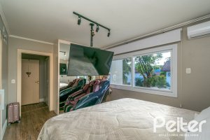 Casa em Condomínio à venda com 318m², 4 dormitórios, 1 suíte, 3 vagas, no bairro Ipanema em Porto Alegre