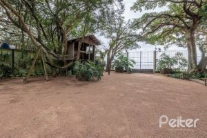 Casa em Condomínio à venda com 318m², 4 dormitórios, 1 suíte, 3 vagas, no bairro Ipanema em Porto Alegre