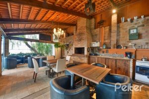 Casa em Condomínio à venda com 318m², 4 dormitórios, 1 suíte, 3 vagas, no bairro Ipanema em Porto Alegre