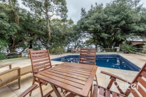 Casa em Condomínio à venda com 318m², 4 dormitórios, 1 suíte, 3 vagas, no bairro Ipanema em Porto Alegre