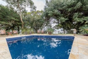 Casa em Condomínio à venda com 318m², 4 dormitórios, 1 suíte, 3 vagas, no bairro Ipanema em Porto Alegre