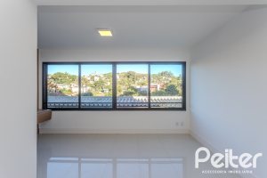 Apartamento à venda com 64m², 2 dormitórios, 1 suíte, 1 vaga, no bairro Tristeza em PORTO ALEGRE