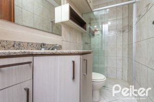 Casa em Condomínio à venda com 182m², 3 dormitórios, 1 suíte, 2 vagas, no bairro Cristal em Porto Alegre