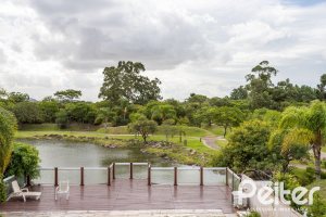 Casa em Condomínio à venda com 463m², 4 dormitórios, 4 suítes, 3 vagas, no bairro Terra Ville em PORTO ALEGRE