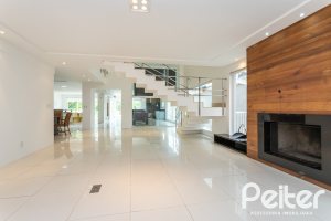 Casa em Condomínio à venda com 463m², 4 dormitórios, 4 suítes, 3 vagas, no bairro Terra Ville em PORTO ALEGRE