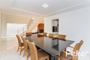 Casa em Condomínio à venda com 463m², 4 dormitórios, 4 suítes, 3 vagas, no bairro Terra Ville em PORTO ALEGRE