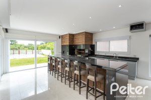 Casa em Condomínio à venda com 463m², 4 dormitórios, 4 suítes, 3 vagas, no bairro Terra Ville em PORTO ALEGRE