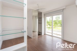 Casa em Condomínio à venda com 463m², 4 dormitórios, 4 suítes, 3 vagas, no bairro Terra Ville em PORTO ALEGRE