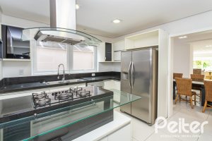 Casa em Condomínio à venda com 463m², 4 dormitórios, 4 suítes, 3 vagas, no bairro Terra Ville em PORTO ALEGRE