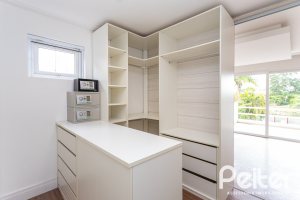 Casa em Condomínio à venda com 463m², 4 dormitórios, 4 suítes, 3 vagas, no bairro Terra Ville em PORTO ALEGRE