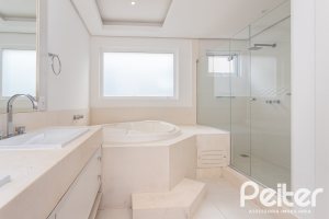 Casa em Condomínio à venda com 463m², 4 dormitórios, 4 suítes, 3 vagas, no bairro Terra Ville em PORTO ALEGRE