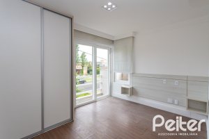 Casa em Condomínio à venda com 463m², 4 dormitórios, 4 suítes, 3 vagas, no bairro Terra Ville em PORTO ALEGRE