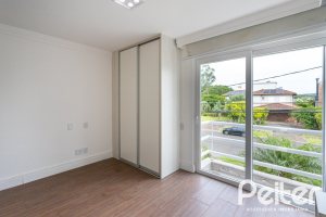 Casa em Condomínio à venda com 463m², 4 dormitórios, 4 suítes, 3 vagas, no bairro Terra Ville em PORTO ALEGRE