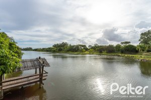Casa em Condomínio à venda com 463m², 4 dormitórios, 4 suítes, 3 vagas, no bairro Terra Ville em PORTO ALEGRE