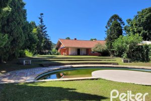 Terreno à venda com 320m², 4 dormitórios, 1 suíte, 6 vagas, no bairro Vila Assunção em Porto Alegre