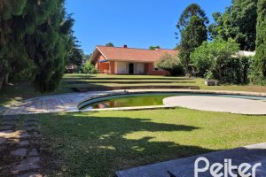 Terreno à venda com 320m², 4 dormitórios, 1 suíte, 6 vagas, no bairro Vila Assunção em Porto Alegre