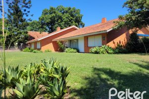 Terreno à venda com 320m², 4 dormitórios, 1 suíte, 6 vagas, no bairro Vila Assunção em Porto Alegre