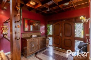 Casa em Condomínio à venda com 565m², 5 dormitórios, 3 suítes, 4 vagas, no bairro Cavalhada em Porto Alegre