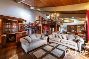 Casa em Condomínio à venda com 565m², 5 dormitórios, 3 suítes, 4 vagas, no bairro Cavalhada em Porto Alegre