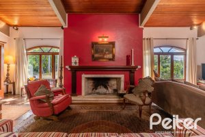 Casa em Condomínio à venda com 565m², 5 dormitórios, 3 suítes, 4 vagas, no bairro Cavalhada em Porto Alegre