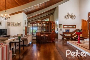 Casa em Condomínio à venda com 565m², 5 dormitórios, 3 suítes, 4 vagas, no bairro Cavalhada em Porto Alegre