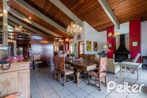 Casa em Condomínio à venda com 565m², 5 dormitórios, 3 suítes, 4 vagas, no bairro Cavalhada em Porto Alegre