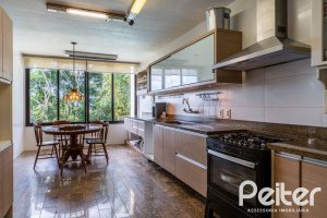 Casa em Condomínio à venda com 565m², 5 dormitórios, 3 suítes, 4 vagas, no bairro Cavalhada em Porto Alegre