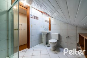 Casa em Condomínio à venda com 565m², 5 dormitórios, 3 suítes, 4 vagas, no bairro Cavalhada em Porto Alegre