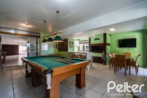 Casa em Condomínio à venda com 565m², 5 dormitórios, 3 suítes, 4 vagas, no bairro Cavalhada em Porto Alegre