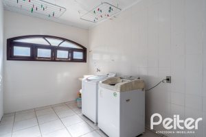 Casa em Condomínio à venda com 565m², 5 dormitórios, 3 suítes, 4 vagas, no bairro Cavalhada em Porto Alegre