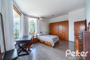 Casa em Condomínio à venda com 495m², 3 dormitórios, 1 suíte, 5 vagas, no bairro Nonoai em Porto Alegre