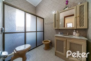 Casa em Condomínio à venda com 495m², 3 dormitórios, 1 suíte, 5 vagas, no bairro Nonoai em Porto Alegre