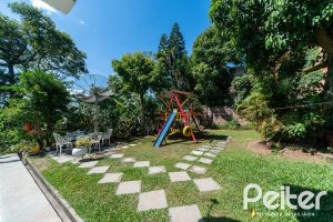 Casa em Condomínio à venda com 495m², 3 dormitórios, 1 suíte, 5 vagas, no bairro Nonoai em Porto Alegre