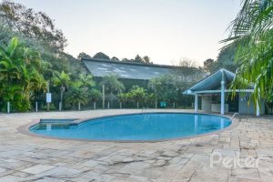 Casa em Condomínio à venda com 239m², 4 dormitórios, 4 suítes, 4 vagas, no bairro Terra Ville em Porto Alegre