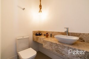 Casa em Condomínio à venda com 239m², 4 dormitórios, 4 suítes, 4 vagas, no bairro Terra Ville em Porto Alegre