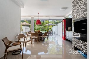 Casa em Condomínio à venda com 239m², 4 dormitórios, 4 suítes, 4 vagas, no bairro Terra Ville em Porto Alegre