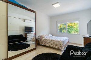 Casa em Condomínio à venda com 239m², 4 dormitórios, 4 suítes, 4 vagas, no bairro Terra Ville em Porto Alegre