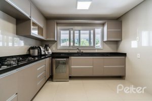 Casa em Condomínio à venda com 239m², 4 dormitórios, 4 suítes, 4 vagas, no bairro Terra Ville em Porto Alegre