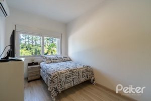 Casa em Condomínio à venda com 239m², 4 dormitórios, 4 suítes, 4 vagas, no bairro Terra Ville em Porto Alegre