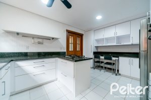Casa em Condomínio à venda com 596m², 4 dormitórios, 4 suítes, 4 vagas, no bairro Terra Ville em PORTO ALEGRE