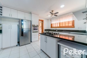 Casa em Condomínio à venda com 596m², 4 dormitórios, 4 suítes, 4 vagas, no bairro Terra Ville em PORTO ALEGRE