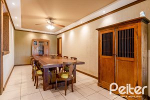 Casa em Condomínio à venda com 596m², 4 dormitórios, 4 suítes, 4 vagas, no bairro Terra Ville em PORTO ALEGRE