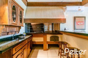 Casa em Condomínio à venda com 596m², 4 dormitórios, 4 suítes, 4 vagas, no bairro Terra Ville em PORTO ALEGRE