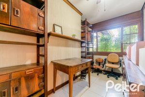 Casa em Condomínio à venda com 596m², 4 dormitórios, 4 suítes, 4 vagas, no bairro Terra Ville em PORTO ALEGRE