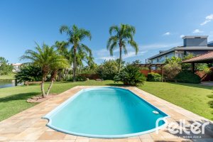 Casa em Condomínio à venda com 596m², 4 dormitórios, 4 suítes, 4 vagas, no bairro Terra Ville em PORTO ALEGRE