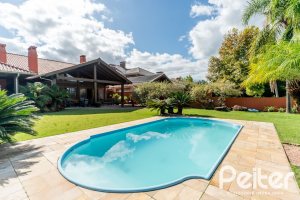 Casa em Condomínio à venda com 596m², 4 dormitórios, 4 suítes, 4 vagas, no bairro Terra Ville em PORTO ALEGRE