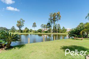 Casa em Condomínio à venda com 596m², 4 dormitórios, 4 suítes, 4 vagas, no bairro Terra Ville em PORTO ALEGRE